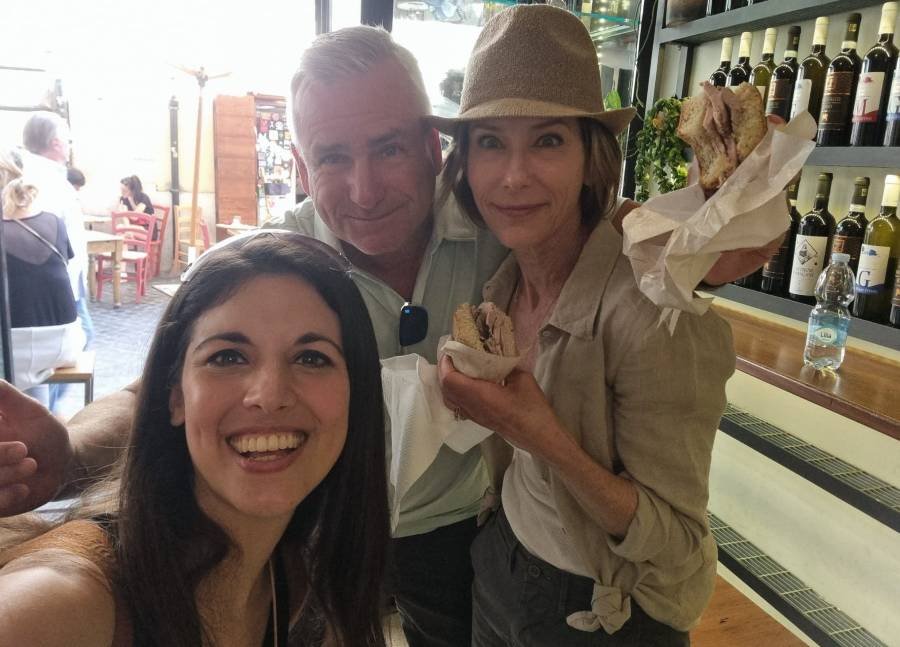 Guest enjoying local street food during a private food tour in Rome with a local expert